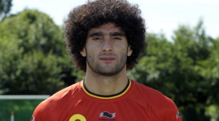 Marouane Fellaini chops off his famous afro