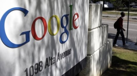 Google revenue helped by ads as business boss leaves