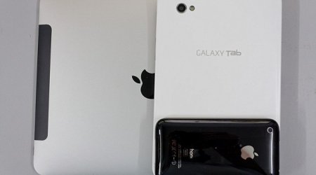 New trend sees more people using their TABLETS as a phone - PHOTO