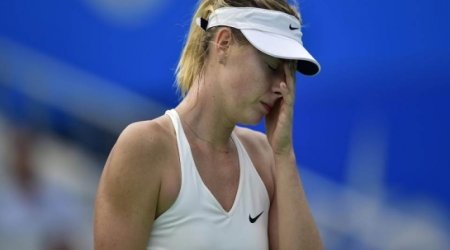 Sharapova dumped out by Swiss qualifier in Wuhan