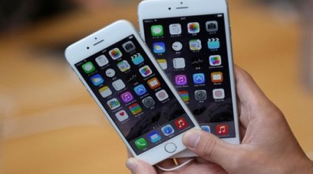 iPhone users stop upgrading to Apple's iOS 8 after...