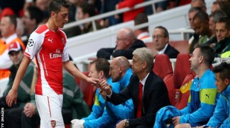 Mesut Ozil: Arsenal midfielder out with knee injury for up to 12 weeks