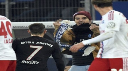 Ribery hit in the face with pitch invader's scarf