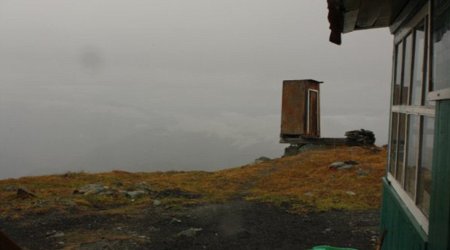 Precarious toilet is perched over 2,000ft Siberian cliff - PHOTO