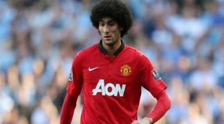 Fellaini out for six weeks after wrist surgery