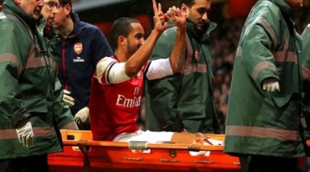 Injured Theo Walcott to miss six months