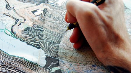 Artist turns maps into extraordinary portraits - PHOTO