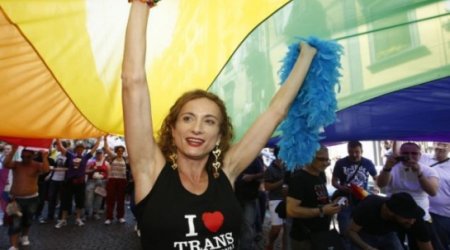 Italy's first transgender MP arrested in Sochi for carrying 'Gay is OK' rainbow flag