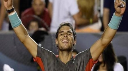 Nadal battles to victory in Rio final