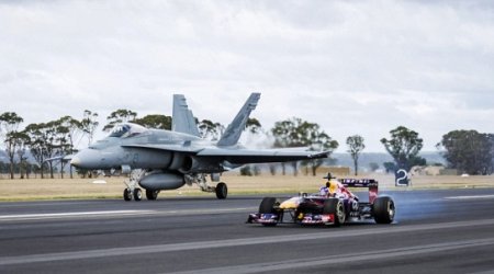 Formula One race car takes on F-18 Hornet fighter jet - PHOTO+VIDEO