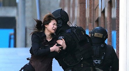 Lights out at siege cafe as stand-off enters 12th hour