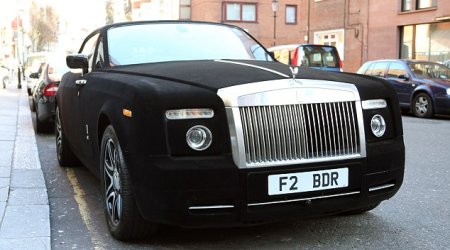 Rolls Royce covered in BLACK VELVET is spotted outside Harrods