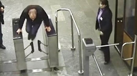 Ukrainian man tries to jump over 1ft-high ticket barrier but...