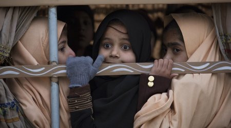 Pakistani school return to the scene where 133 of their classmates were slaughtered