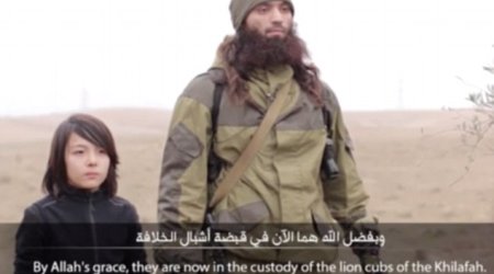 ISIS release new footage claiming to show a child executing two Russian 'spies'