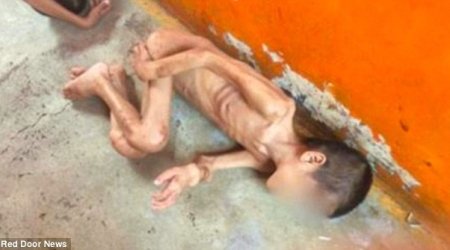 Children CAGED to keep the streets clean for the Pope