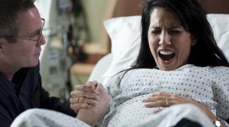Childbirth pain could be made WORSE by presence of partner