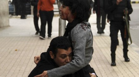 Mourners gather to bury mother, 32, gunned down by Cairo police