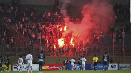 Soccer fans clash with the police in Cairo; at least 19 dead