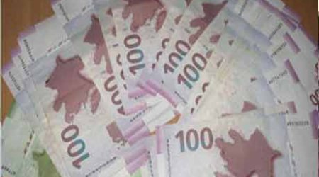 Azeri central bank devalues currency by 33.5 pct to dollar