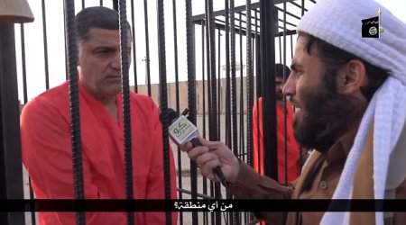 Twisted new ISIS video shows 'Kurdish Peshmerga' fighters paraded in cages