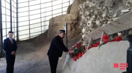 Американский имам у Комплекса Губинского геноцида