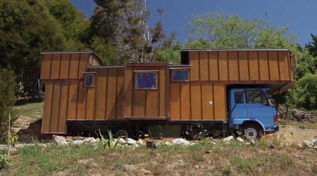 Couple converts 30-year-old flatbed truck into two bedroom solar