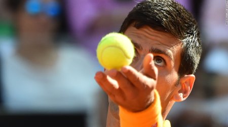 Flawless Novak Djokovic wins Roman duel with Roger Federer