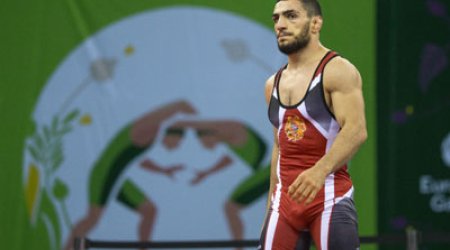 Armenian Arutyunyan heckled as misses wrestling gold