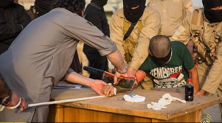 Blindfolded, pinned down and butchered with a MEAT CLEAVER