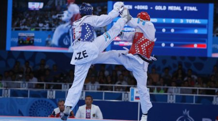 Joker Isaev keeps cool head to land Taekwondo gold for hosts