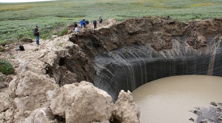 Mystery of Siberia's 200ft-deep craters solved