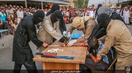 ISIS thugs chop off suspected robber's hand