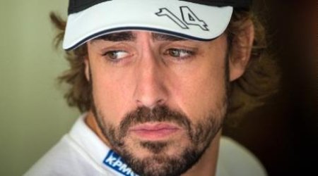 Fernando Alonso: I stayed at 'sad' Ferrari too long