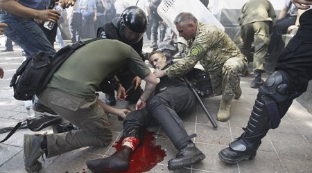 Policeman dies, 100 injured after grenade explodes outside Ukraine parliament