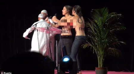 Topless feminist protestors storm Muslim conference