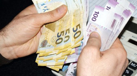 Azerbaijan may devalue manat again by 25% in early 2016: EIU