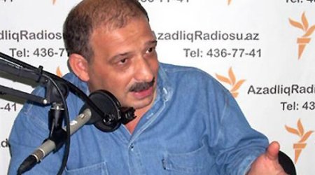 Azerbaijani journalist stands trial over alleged treason
