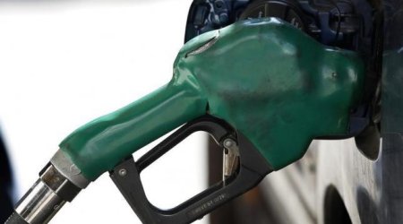 Tumbling oil trades below $30 a barrel for first time in 12 years