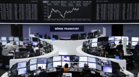U.S. shares tumble; Brent crude slips below $30