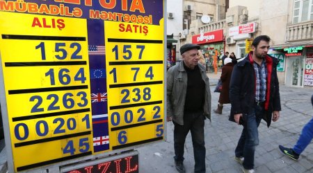 Azerbaijan considers tighter currency controls to staunch losses