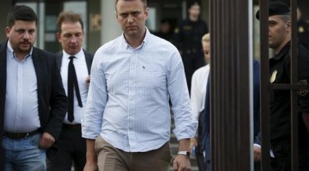 Kremlin critic Navalny files lawsuit against Putin