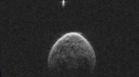 Is this a 230ft UFO orbiting an asteroid?