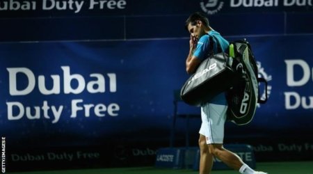 Novak Djokovic retires from Dubai quarter-finals with eye problem