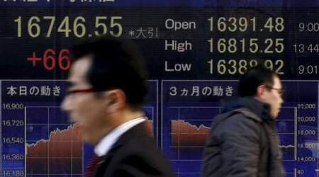Asia stocks, oil jump as dollar sags after Fed