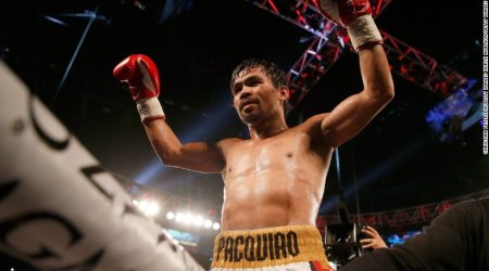 Manny Pacquiao beats Bradley, hints at retiring