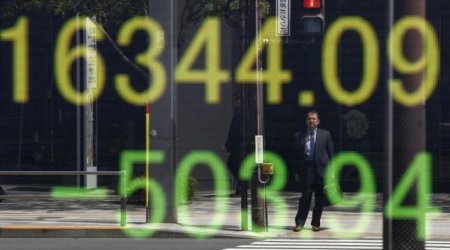 Asian shares rise, taking cue from Wall Street