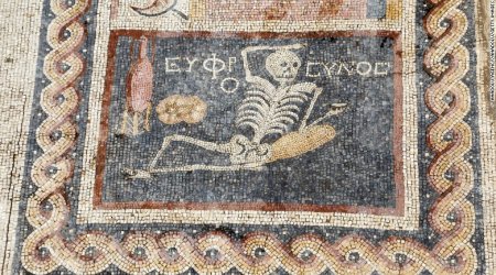 Laid-back ancient skeleton mosaic has sage advice