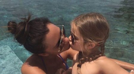 How controversial is it to kiss your child on the lips?