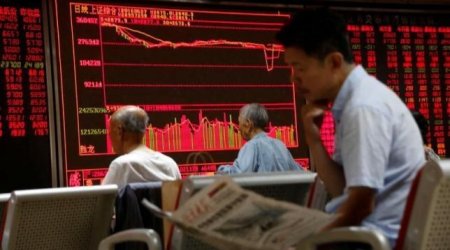 Asian shares dip, crude oil extends losses